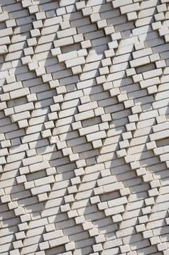 A pattern made of white bricks in the form of diamond shapes. Decoration of t Foto stock