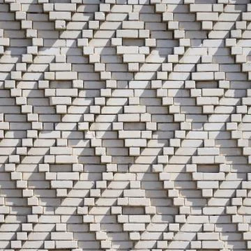 A pattern made of white bricks in the form of diamond shapes. Decoration of t Foto stock
