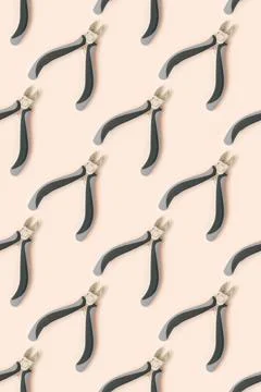 Pattern made of wire cutters. Stock Photos