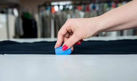 Pattern making process. Fabric industry production line. Textile factory. Stock Photos