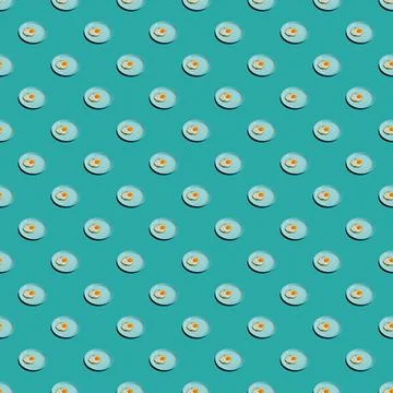 Pattern with many fried eggs on plates Stock Photos
