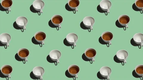 Pattern with many tea cups and empty cups animated on light green background Stock Footage 134181836
