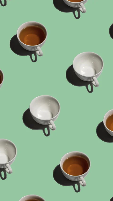 Pattern with many tea cups and empty cups animated on light green background Stock Footage 313520856