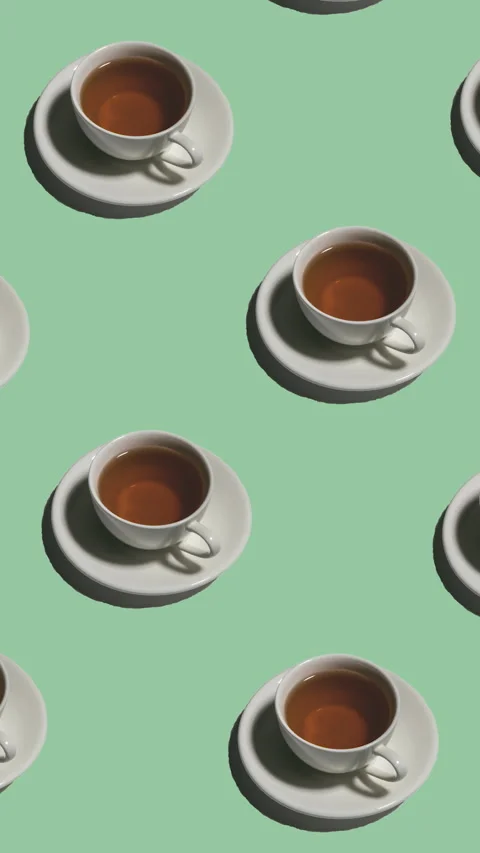 Pattern with many tea cups on saucers animated on green background Stock Footage 314099265