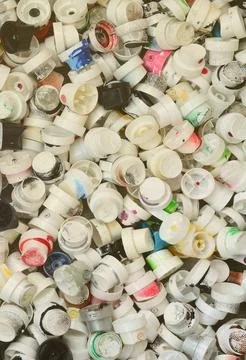 A pattern of many used and soiled nozzles from spray cans with aerosol paint Stock Photos