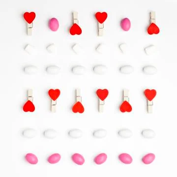 Pattern Marshmallow, White and Pink Candies and Clothespin with red hearts To Stock Photos