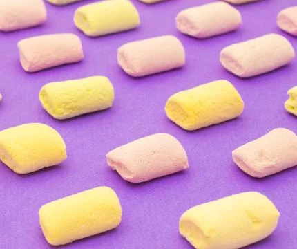Pattern with marshmallows on violet background Stock Photos
