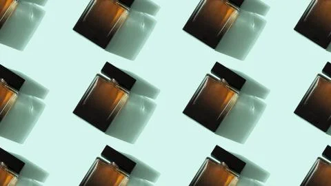 Pattern of men's eau de Parfum on blue background Stock Photos