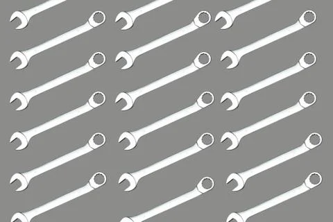 Pattern metal spanner on 18, on a grey background. Stock Photos