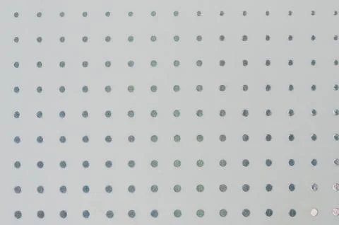 Pattern of metallic circles on white paper background Foto stock