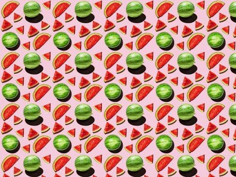 Pattern Mini Watermelon and slices on a pink background with a hard shadow 写真素材