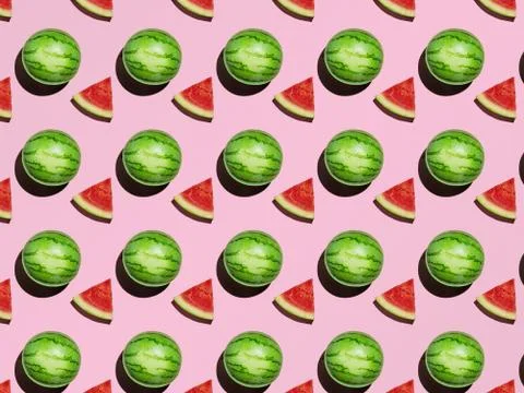 Pattern Mini Watermelon and slices on a pink background with a hard shadow Stock Photos