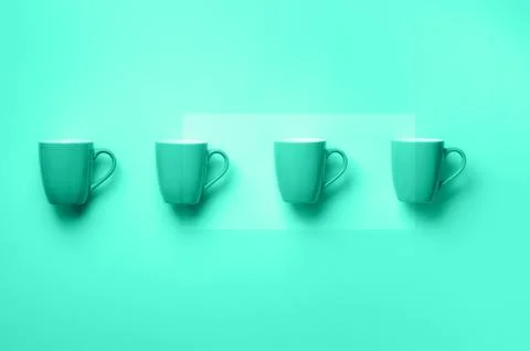 Pattern from mint cups over trendy color background. Trendy green and turquoise Stock Photos