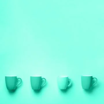 Pattern from mint cups over trendy color background. Trendy green and turquoise Stock Photos
