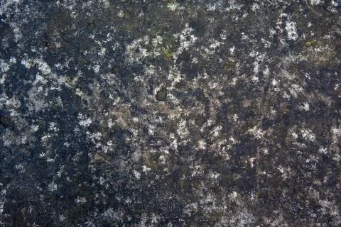 Pattern of modern style design decorative uneven cracked real stone wall surf Stock Photos