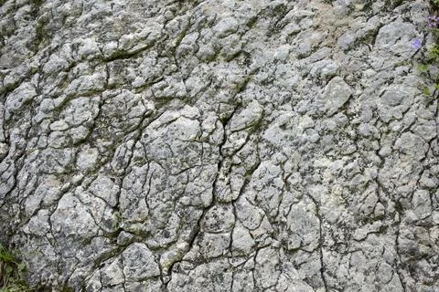 Pattern of a mountain boulder, rock wall texture Stock Photos