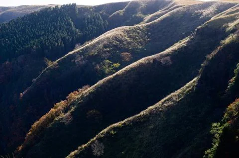 Pattern of mountain range wave surface in Nishikozono Aso, Japan Stock Photos