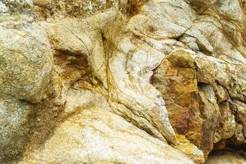 Pattern on a mountain rock with cracks Stock Photos