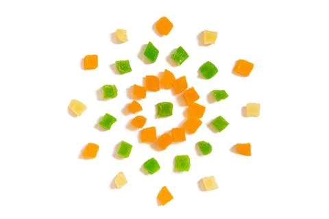 Pattern of Nuts - candied dried pineapple yellow, orange and green on a white Fotos de archivo