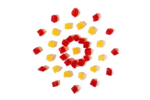 Pattern of Nuts - candied dried pineapple yellow, red  on a white background  Fotos de archivo