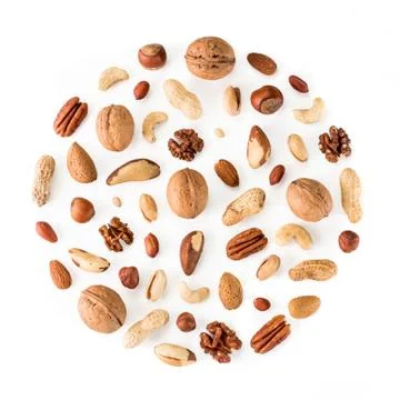 Pattern of nuts in circle form isolated on whie Foto stock