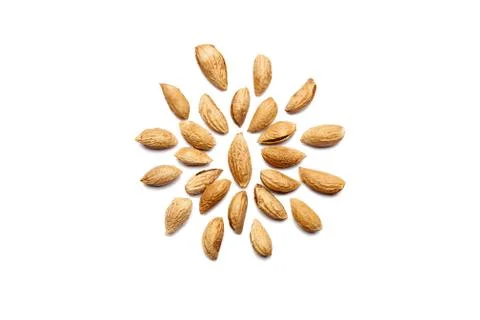 Pattern of Nuts - peeled almonds Badam on a white background in the form of a 写真素材