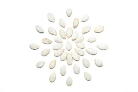Pattern of Nuts - Pumpkin seeds  on a white background in the form of a circl 스톡 사진