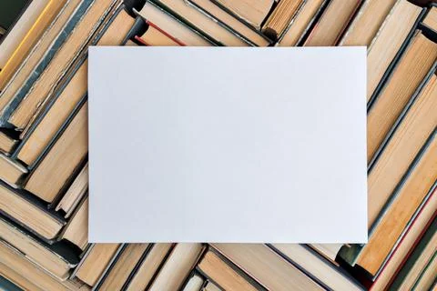 A pattern of old books with a top view. Solid background with copy space. Stock Photos