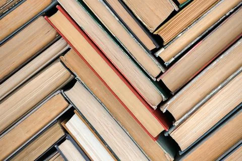 A pattern of old books with a top view. Solid background Foto stock