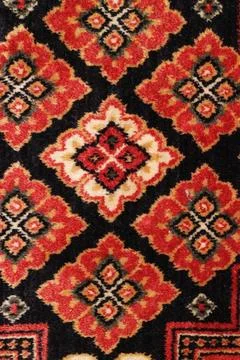 Pattern old carpet geometric pattern old Persian carpet closeup Copyright:... Stock Photos
