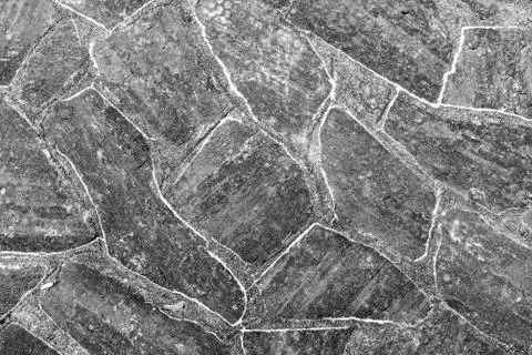 Pattern of old irregular stones gives a harmonic background Foto stock