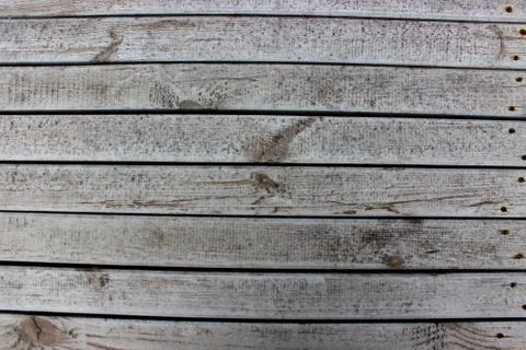 Pattern of an old rough dirty gray wooden boards with rusty nails Stockfoto's