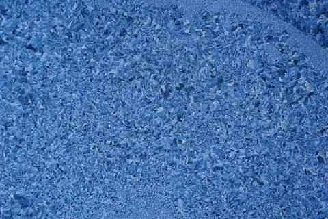 Pattern or pattern of frost and snowflakes on frozen glass of window. Christmas Stockfoto's