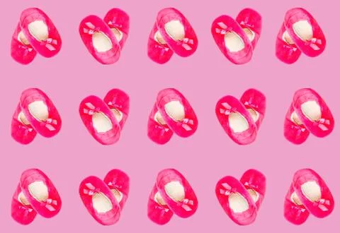 Pattern with a pair of pink warm house Slippers. Stock Photos