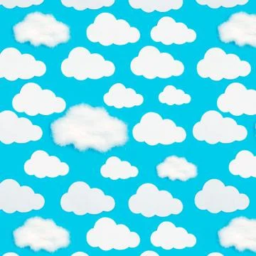 Pattern of paper clouds on a blue background. Stock Photos