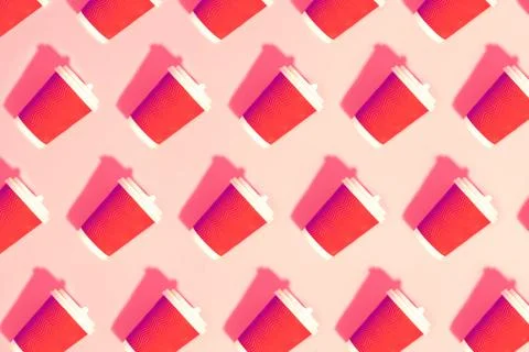 Pattern of paper cups on pink background. Stock Photos