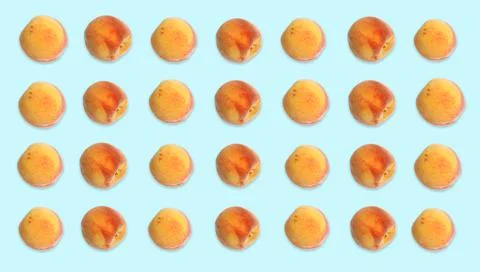 Pattern of peaches on pale light blue background. Banner design Fotos de archivo