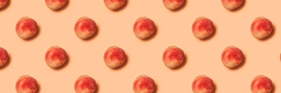 Pattern of peaches on a pastel background. Stock Photos