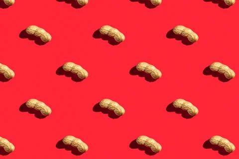 Pattern of peanuts with shell. Fashionable sunny pattern of peanuts with shel Stock Photos
