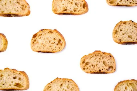 Pattern with pieces of white bread isolated on white background. Stock Photos
