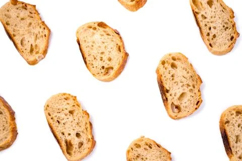 Pattern with pieces of white bread isolated on white background. Foto stock