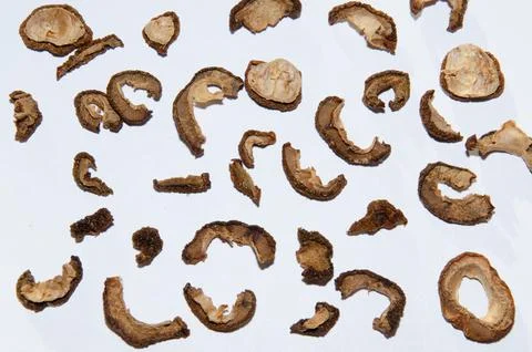 Pattern of a pile of dried apples in slices on a white background. Top view Stock-Fotos