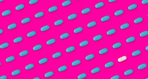 Pattern of pills on a pink background. Many pills on a pink background Stock Photos