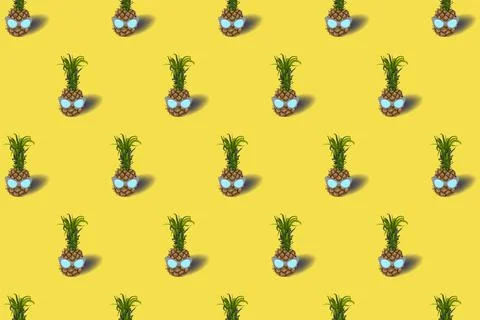 Pattern with pineapple fruit in a sunglasses - on an pastel yellow background Stock Illustration