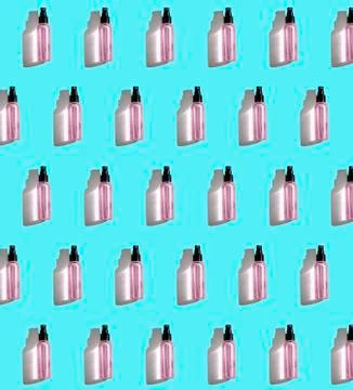 Pattern with pink bottle on a blue background Stock Photos