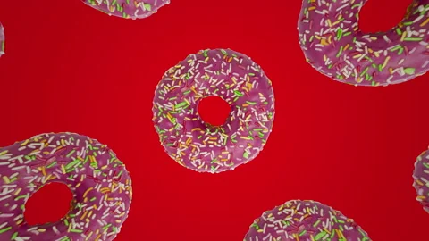 Pattern with pink rotating doughnuts on a blue background Stock Footage 148053138
