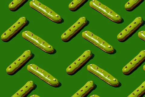 Pattern with pistachio eclair. Monochrome food poster Stock Photos