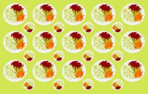 Pattern with a plate containing chopped vegetables, cucumbers, and various pe Stock Photos