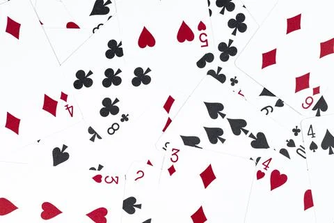 Pattern, playing cards of different suits as a background or backdrop, casino Stock Photos
