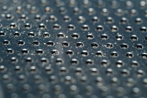 The pattern of points on the metal surface Stock Photos